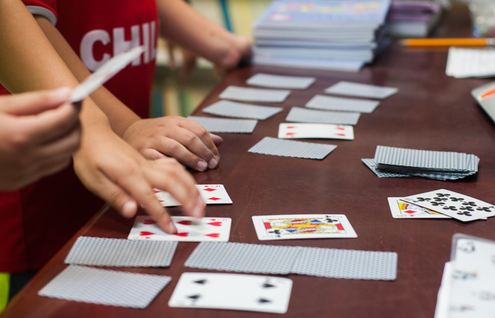 Students use playing cards for various math games.